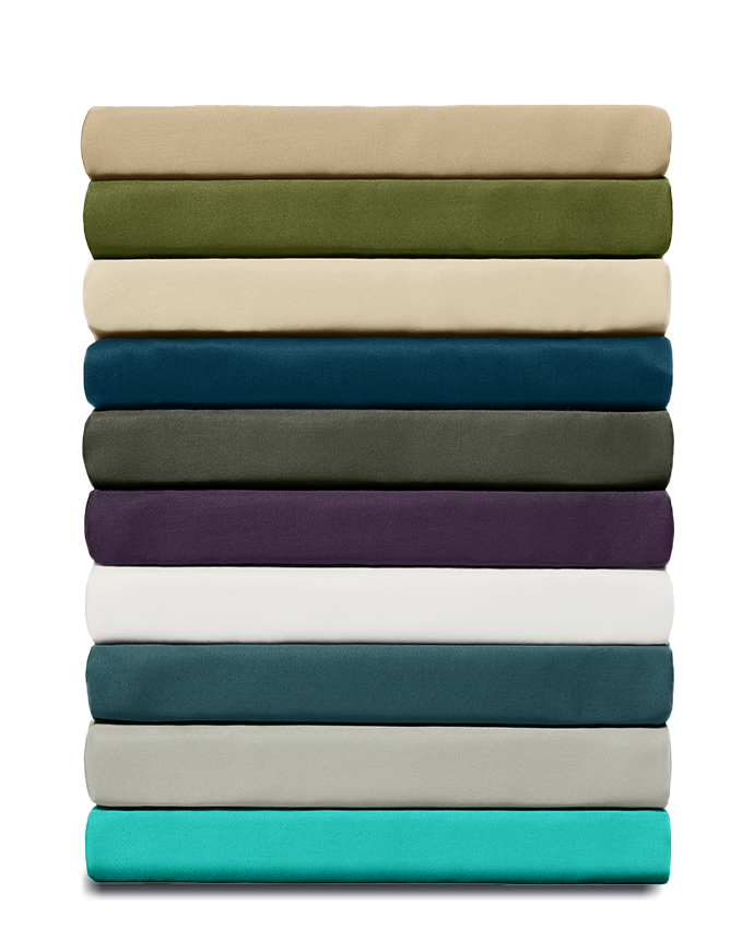Stack of folded bamboo sheets in various colors on a white background