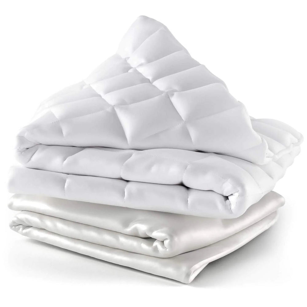 A closer look at a stack of Cosy House Collectionās Weighted blanket and its cover.