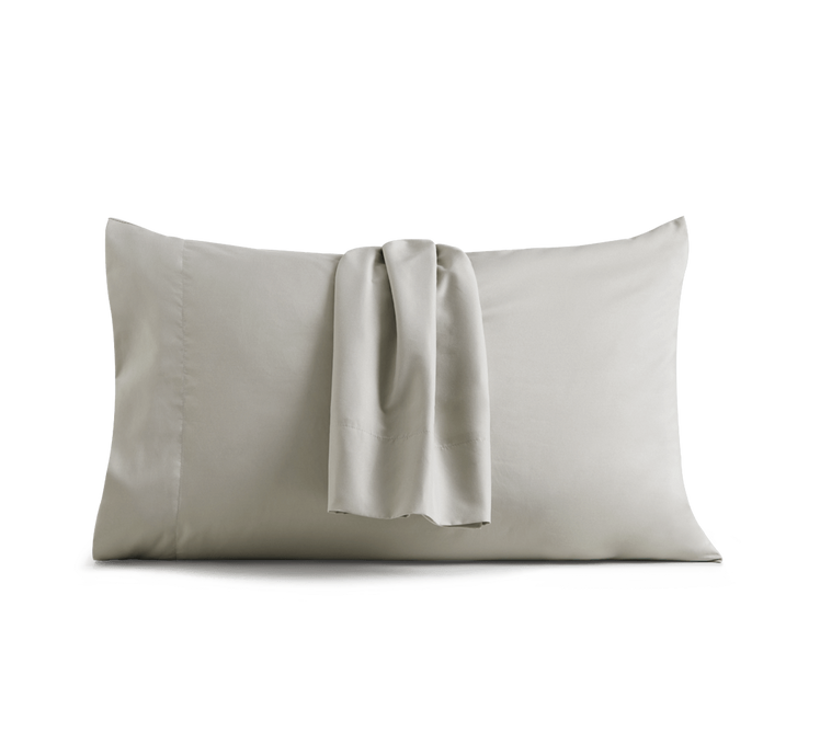 A pillow covered with a Cosy House Collection Luxury pillowcase.