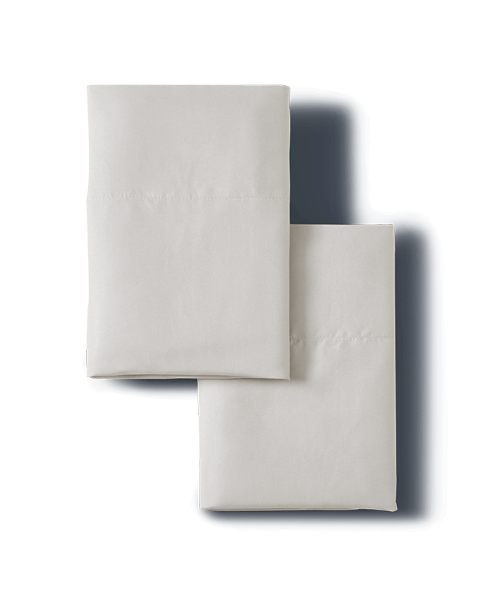 A pair of neatly folded Luxury pillowcases.