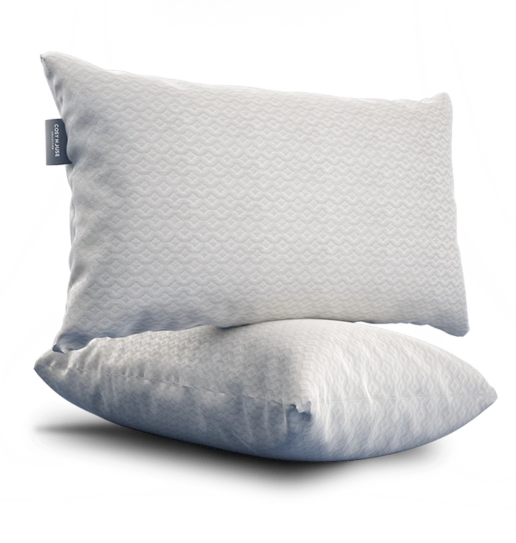 A pair of Cosy House Collection’s Luxury pillows on a pure white backdrop, showcasing a simple and calming design.
