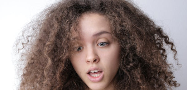 Hair Breakage (or Frizz)? Your Bedding Might Be to Blame!