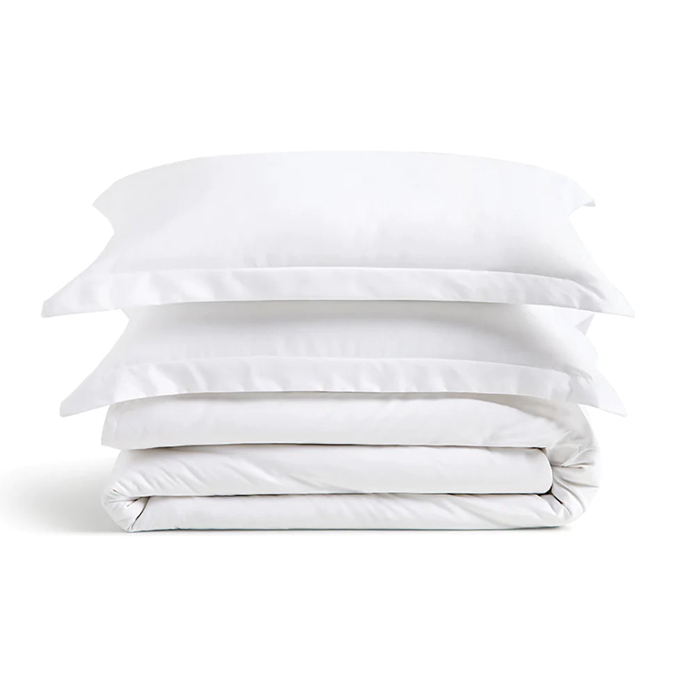 Another view of the stack of comforter and pillows encased with Cosy House Collection’s Luxury Duvet Cover and pillow shams.