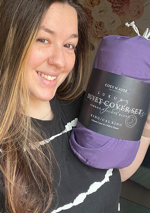Another satisfied customer showing her packaged Luxury Duvet Cover set.