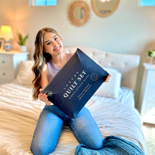A female customer showing her new Luxury Quilt set.