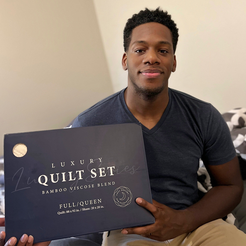 A male customer showing his new Luxury Quilt set.