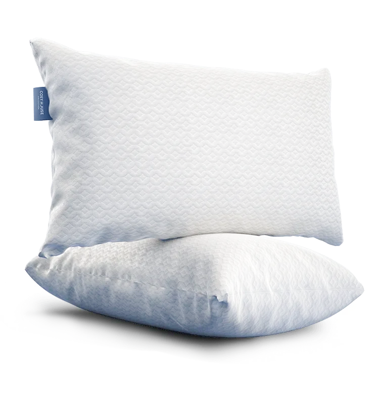 A pair of Cosy House Collection’s Luxury pillows on a pure white backdrop, showcasing a simple and calming design.